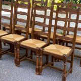 8 solid oak chairs in medium oak with straw, farmhouse style, high back.