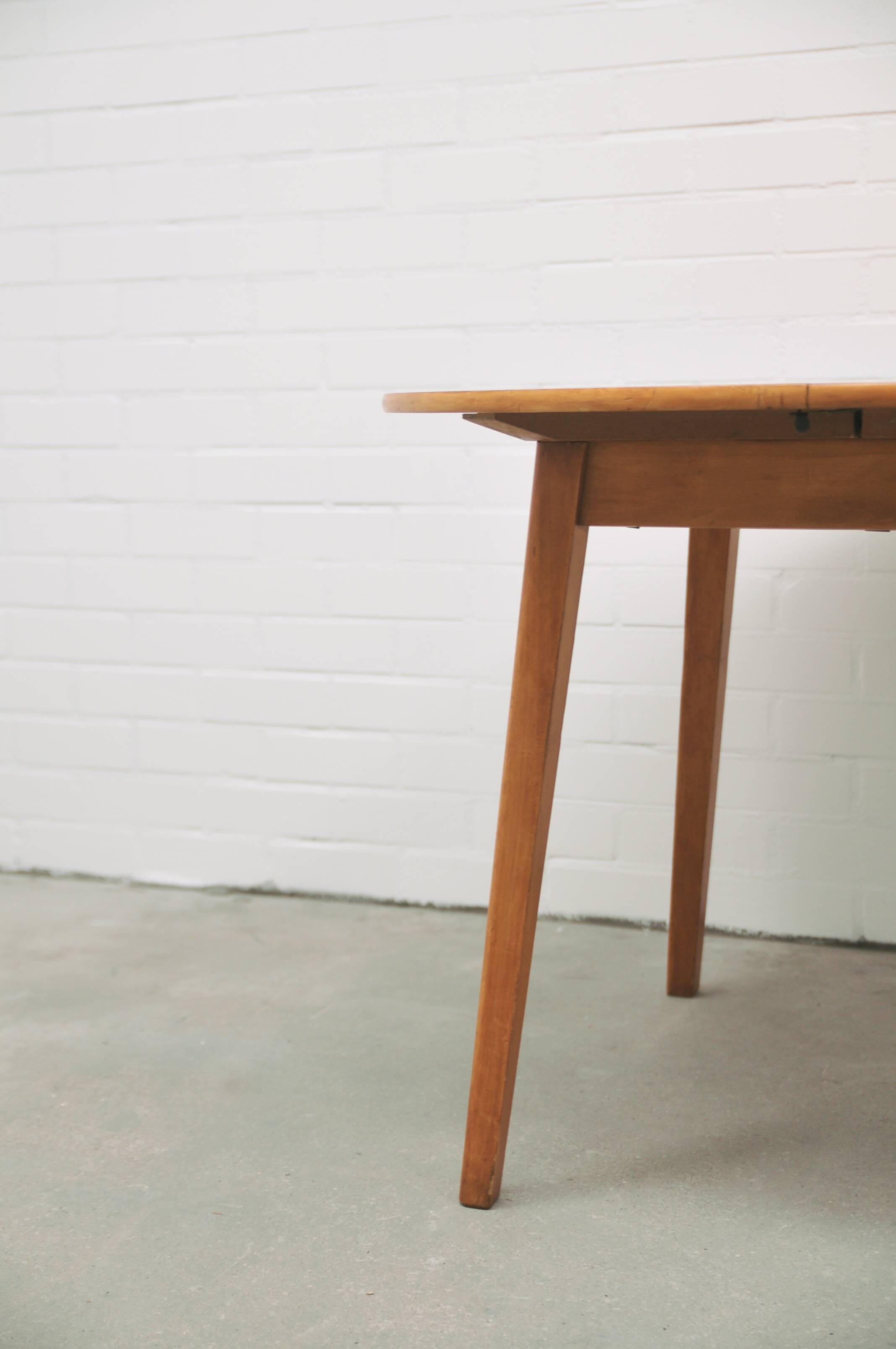vintage round fold-out dining table