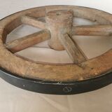 Old wheelbarrow or plow wheel