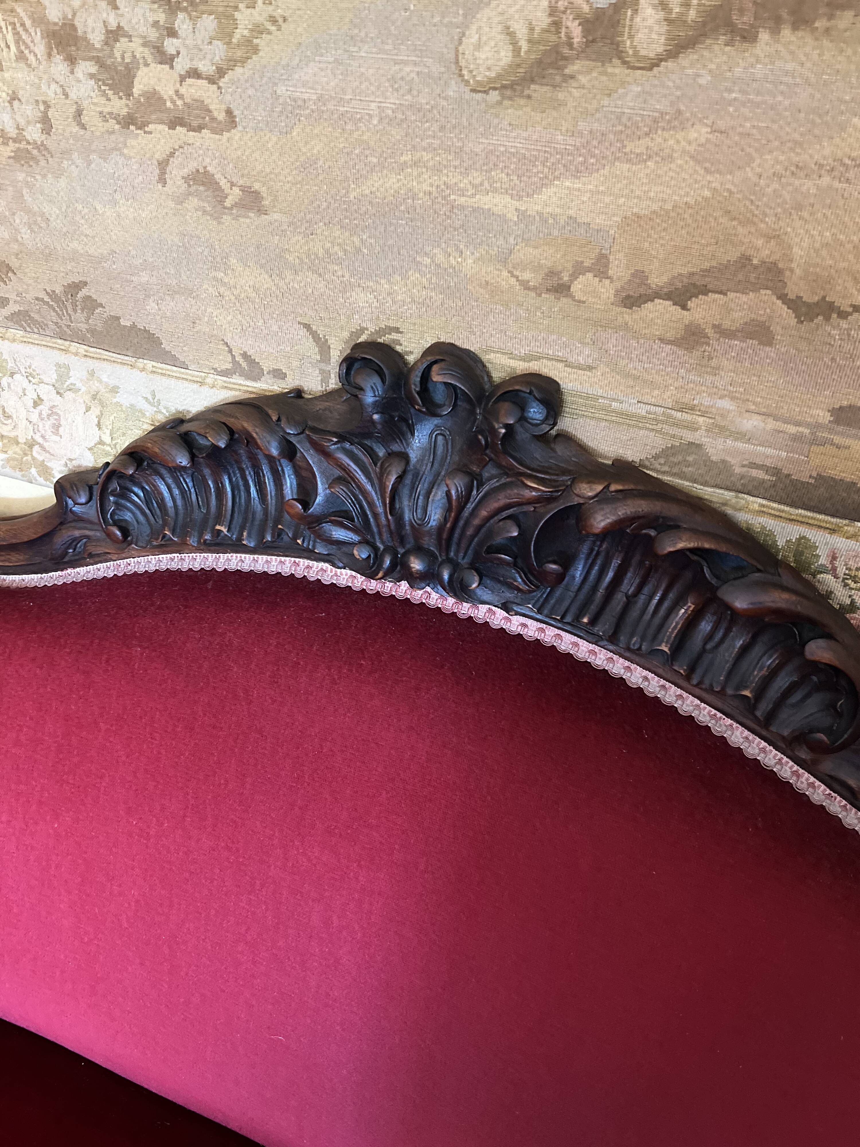 Antique canapé in wood and burgundy velvet in Louis Philippe style.