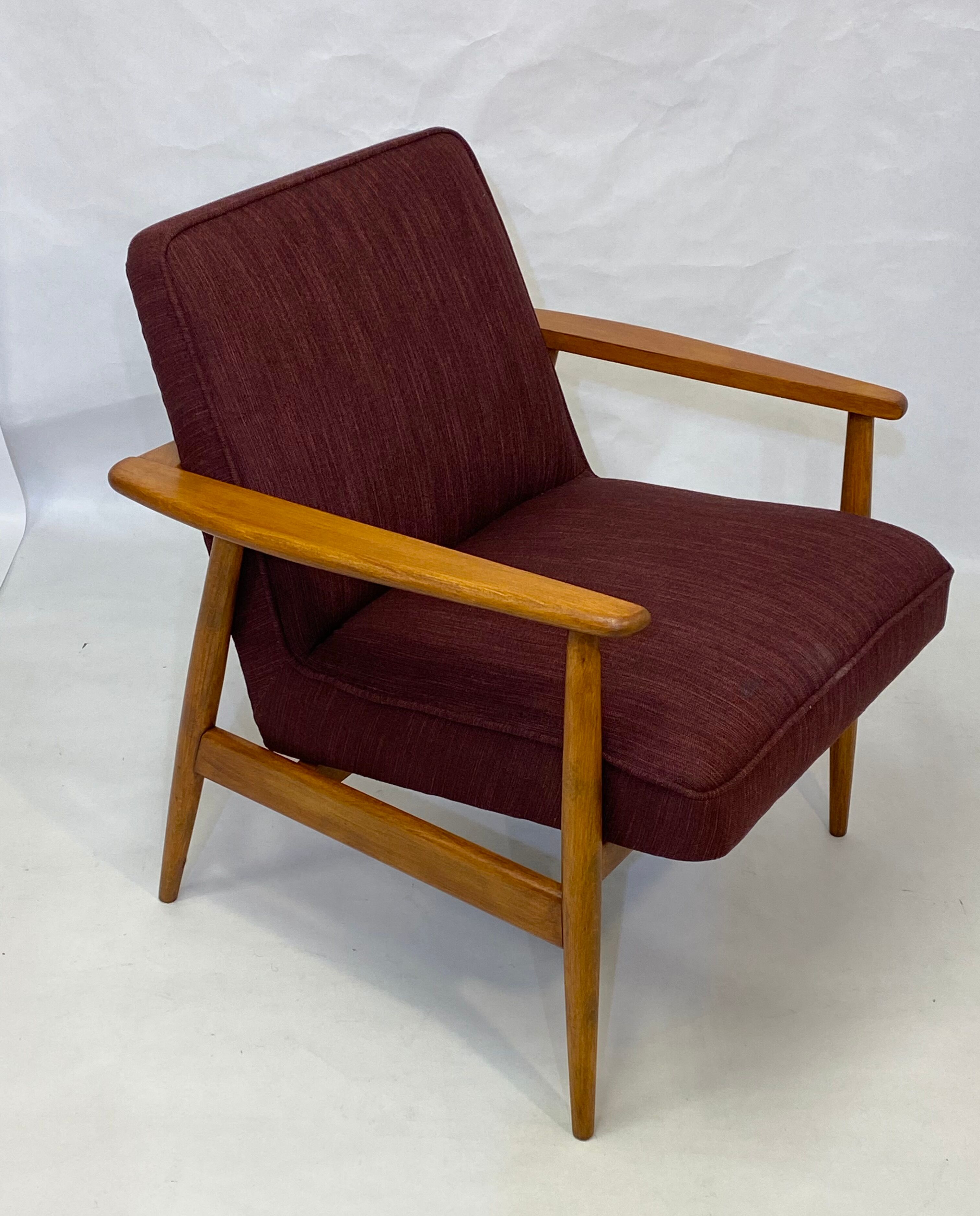 Chair created by Mr. Zieliski year 60 burgundy fabric.