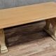 Table en pierre avec piètement à décor de protomes de lions ailés