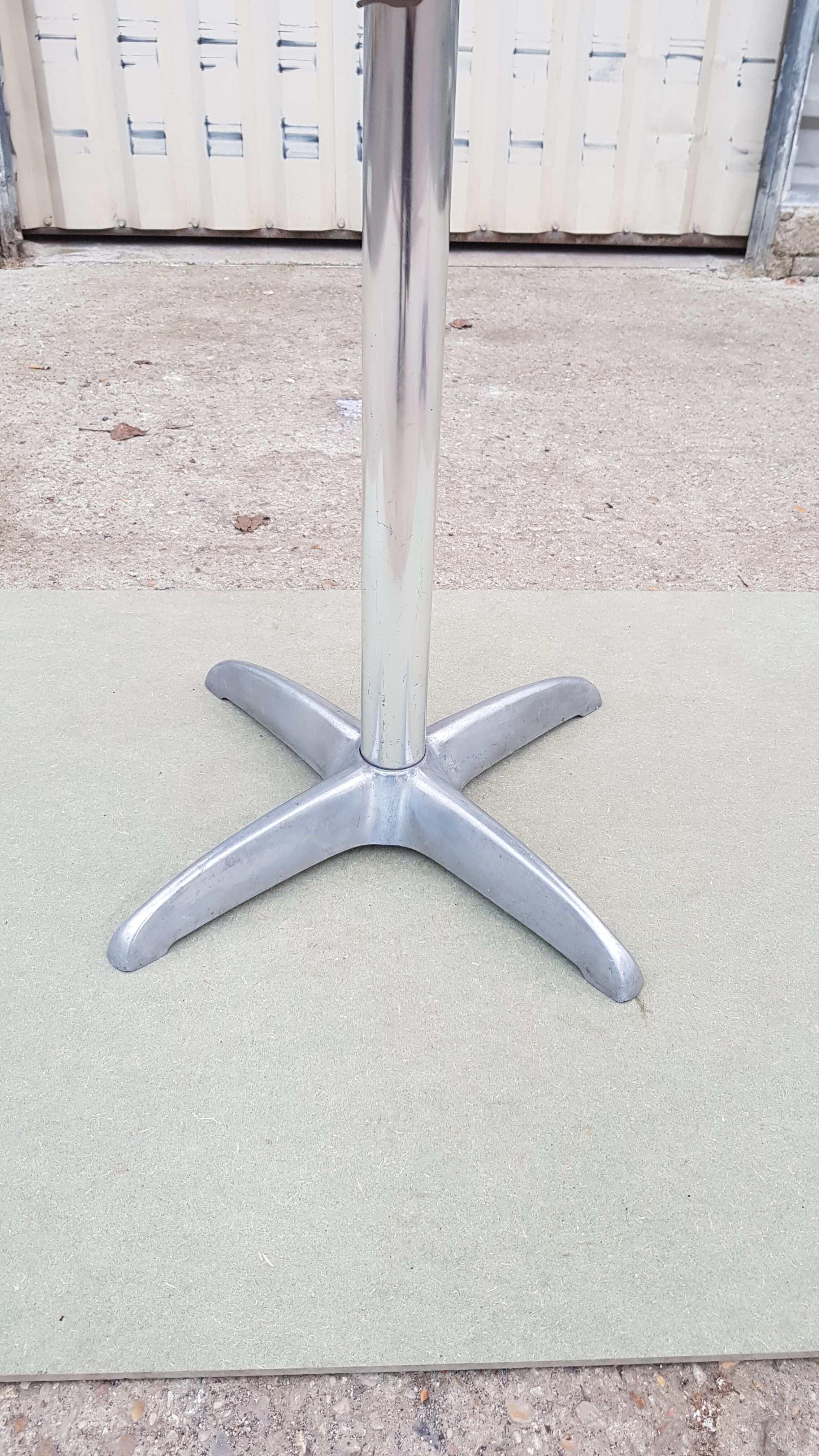 Foldable bistro table with teak top and aluminum base