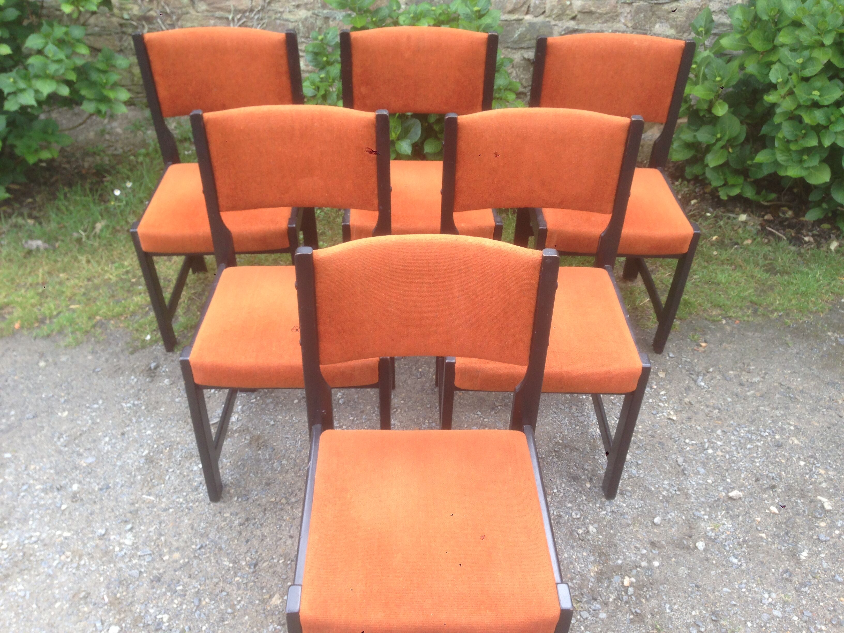 Series of 6 vintage chairs in orange fabric and black lace-up.
