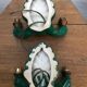 Former pair of art deco green ceramic wall sconces