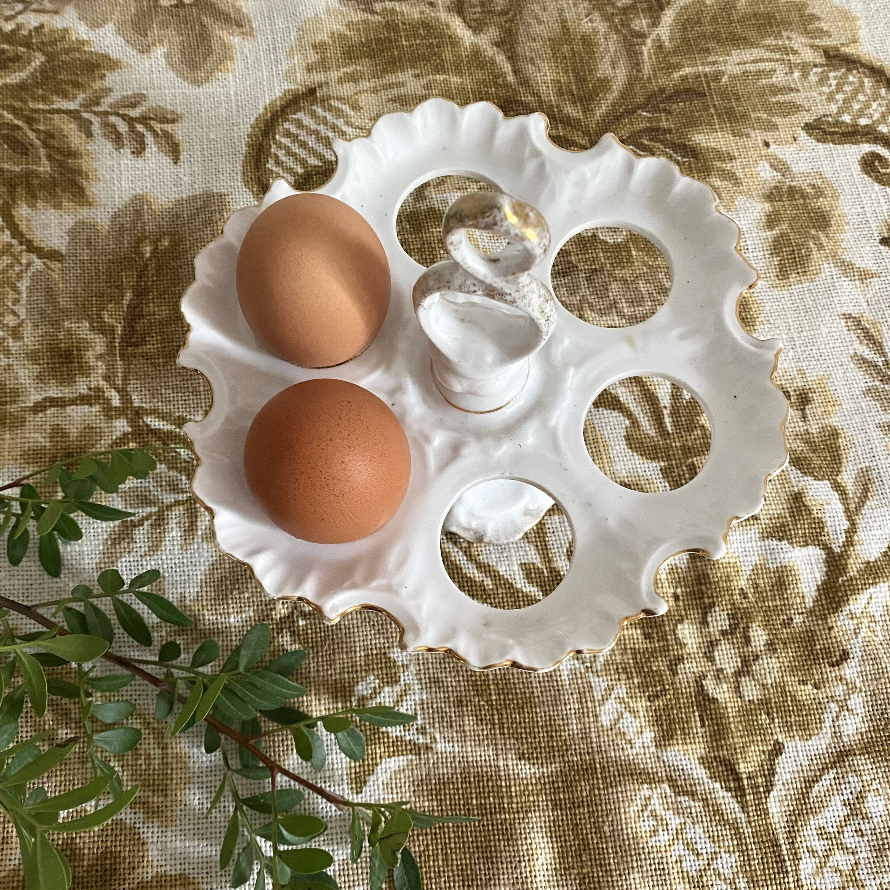 Early 20th century porcelain egg display