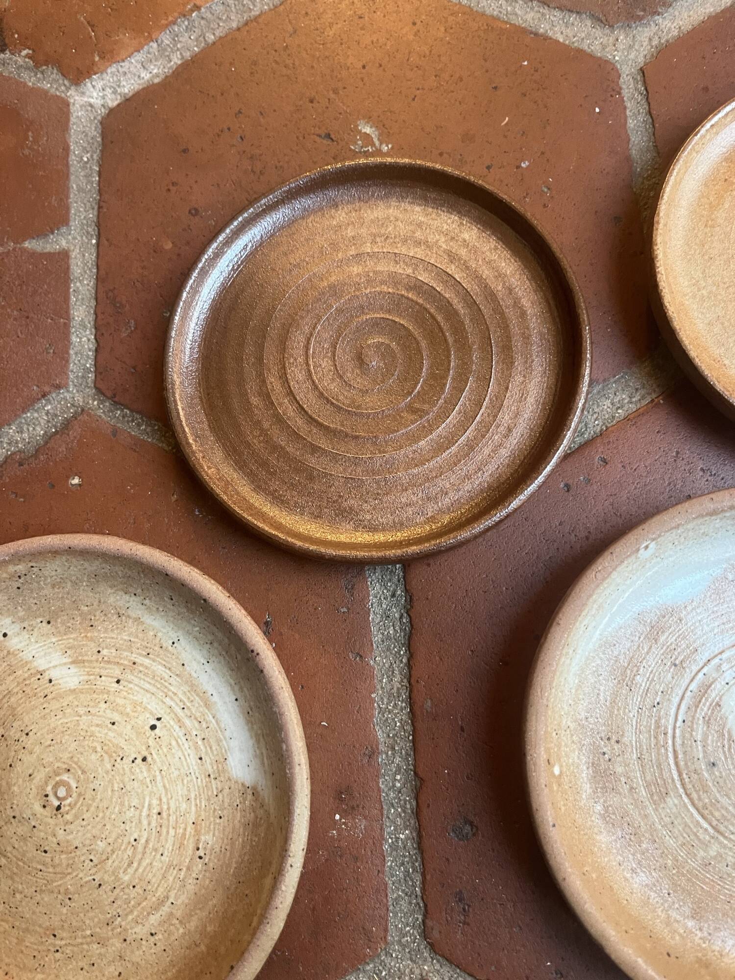 6 small stoneware plates