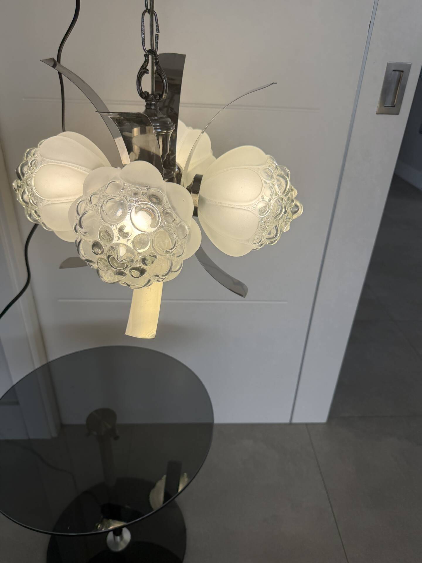 Vintage chandelier with 4 glass bubble globes and silvered metal.