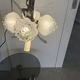 Vintage chandelier with 4 glass bubble globes and silvered metal.