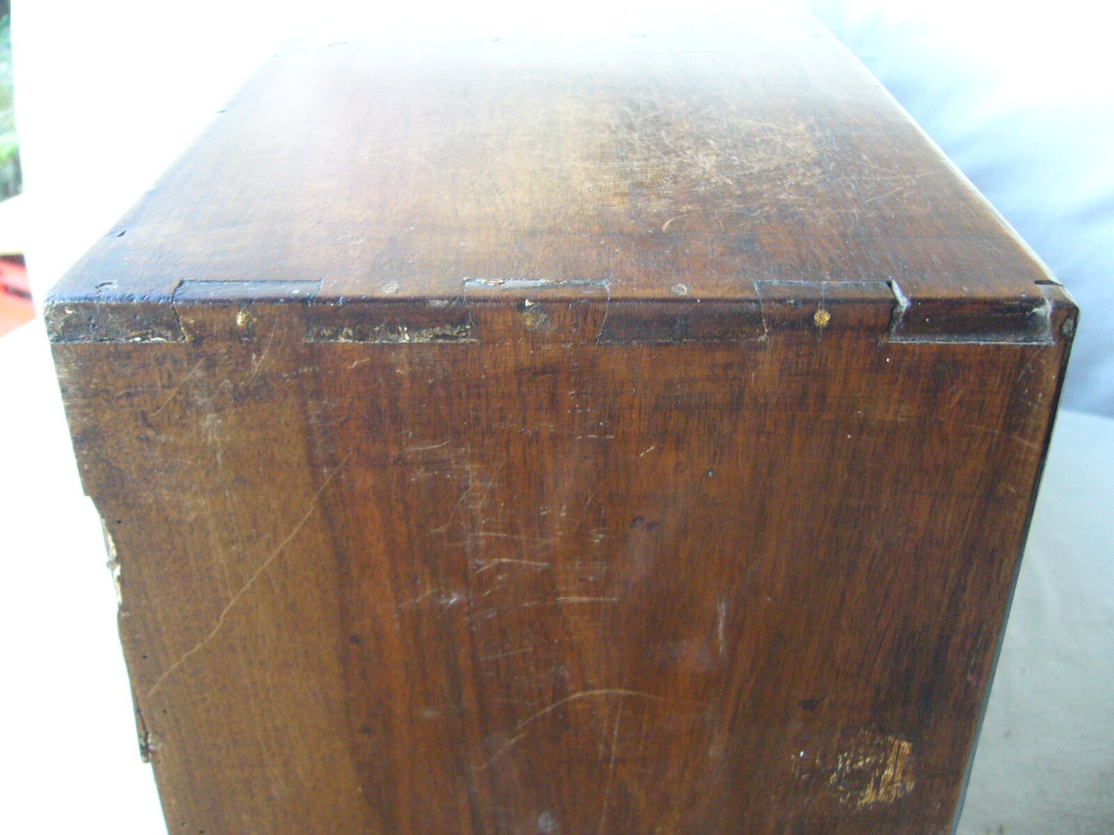 Antique, artisanal seven-drawer furniture