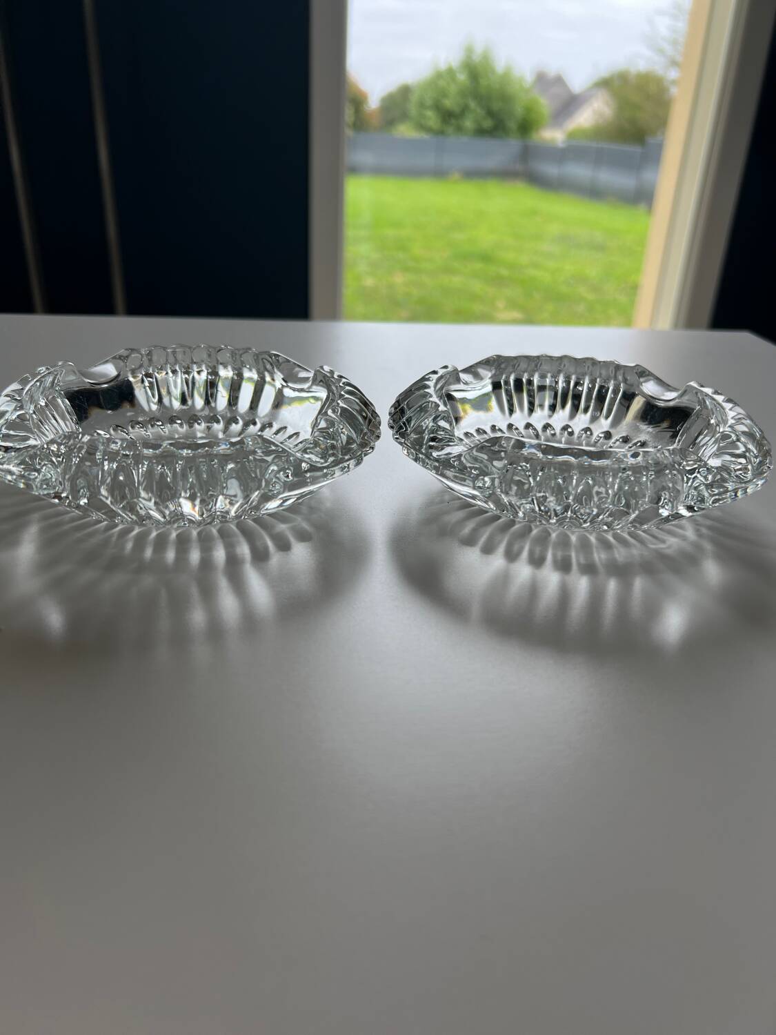 Two French crystal ashtrays