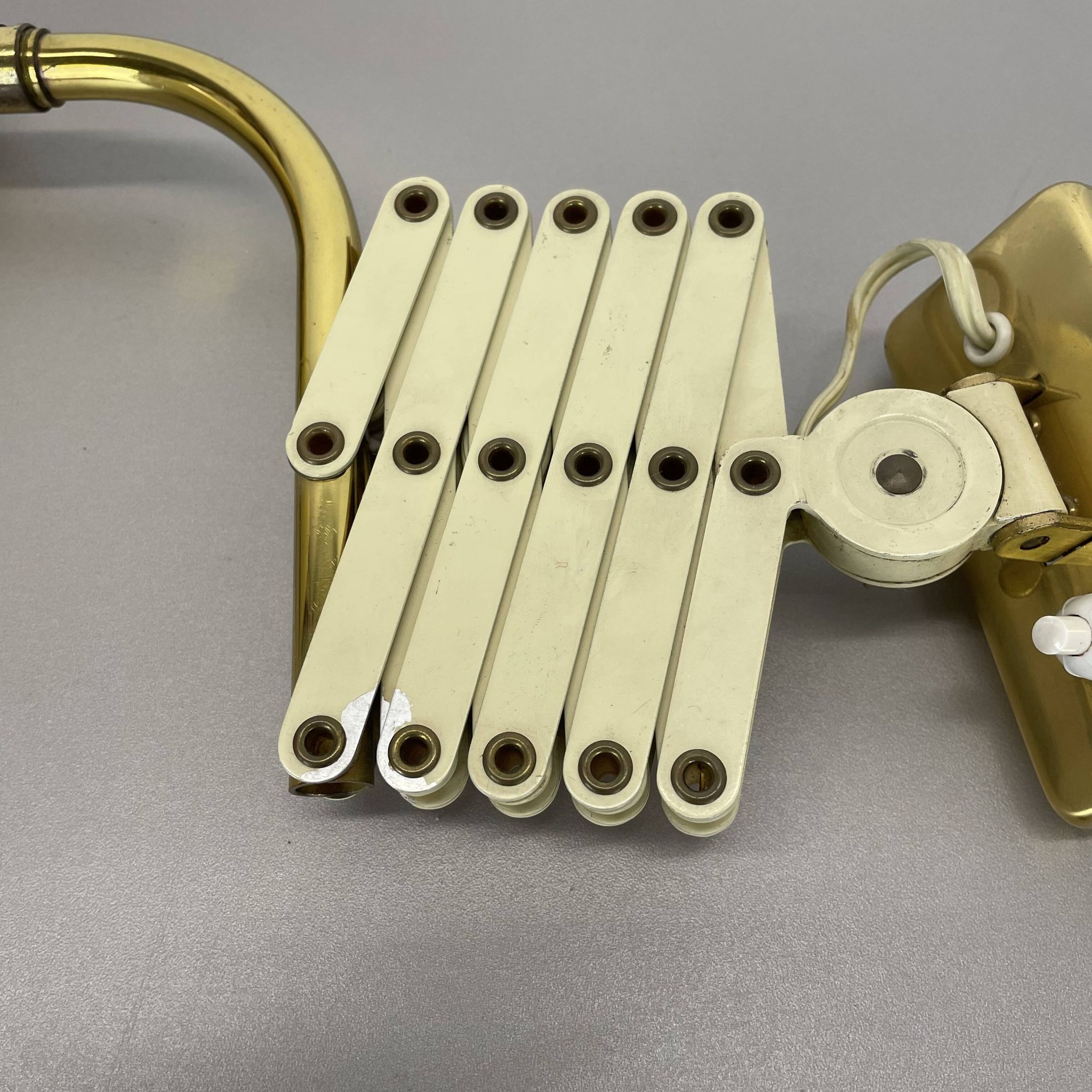 Original brass and metal scissors wall light by SIS Leuchten, Germany, 1950s.