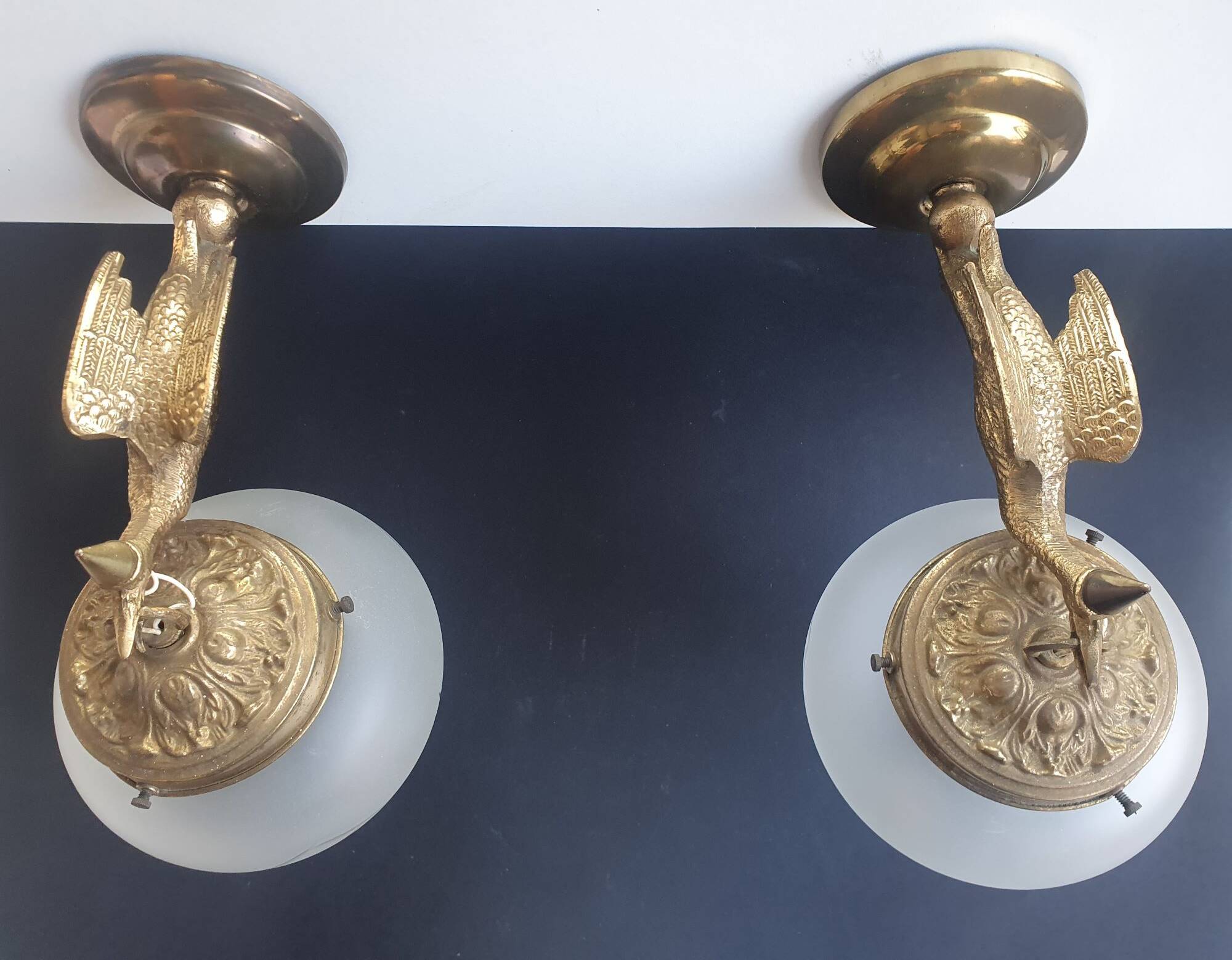 Pair of antique bronze wall sconces