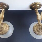 Pair of antique bronze wall sconces