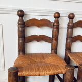 Pair of rustic chairs in the style of Charles Dudouyt.