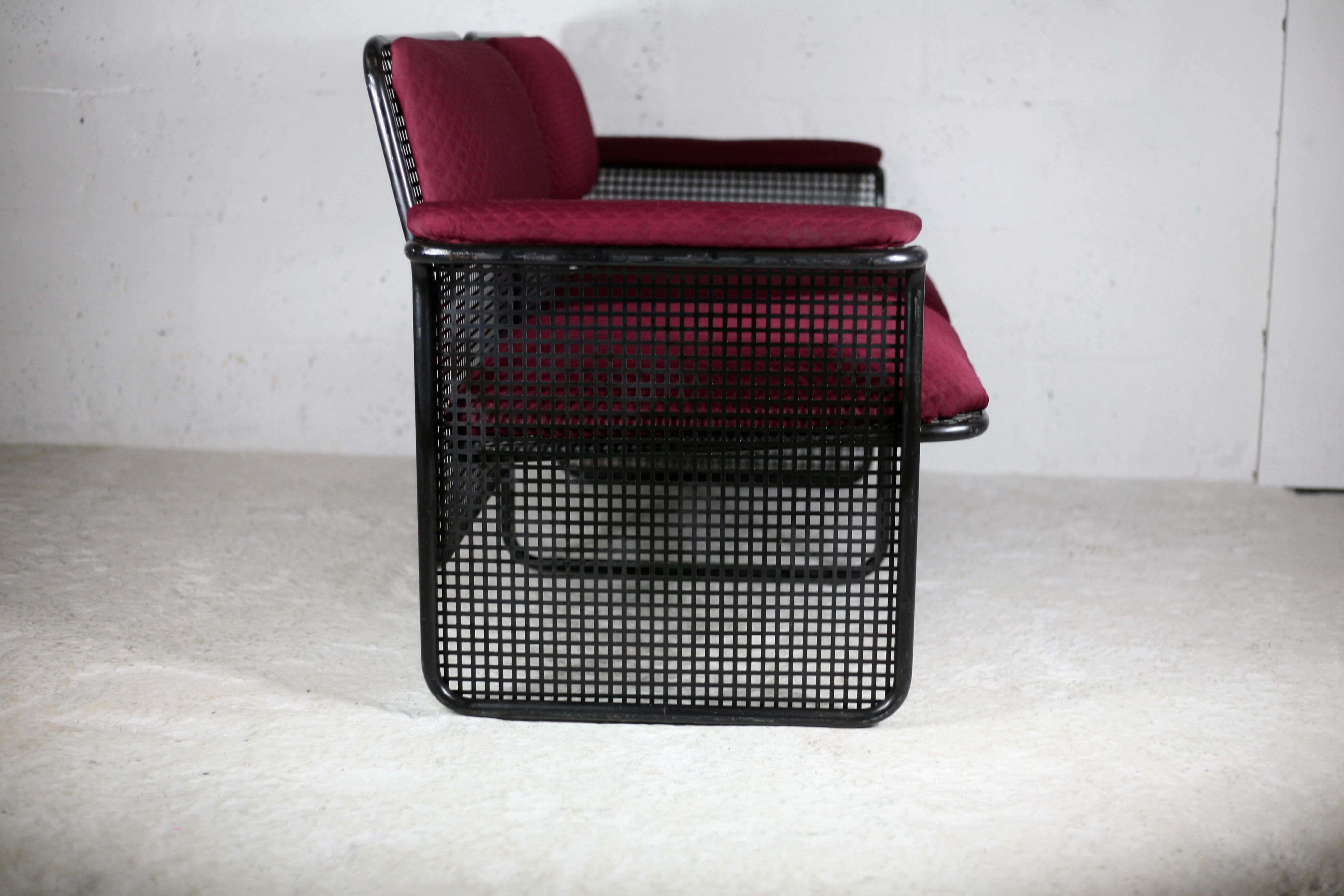 Black honeycomb steel sofa, burgundy fabrics, Italy, circa 1970