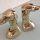 Pair of greenhouse books Greyhound brass heads 60/70