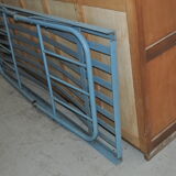 Blue iron bed.