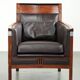 Art Deco design set consisting of an armchair and ottoman