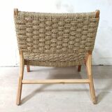 Pair of low armchairs in wood and woven rattan