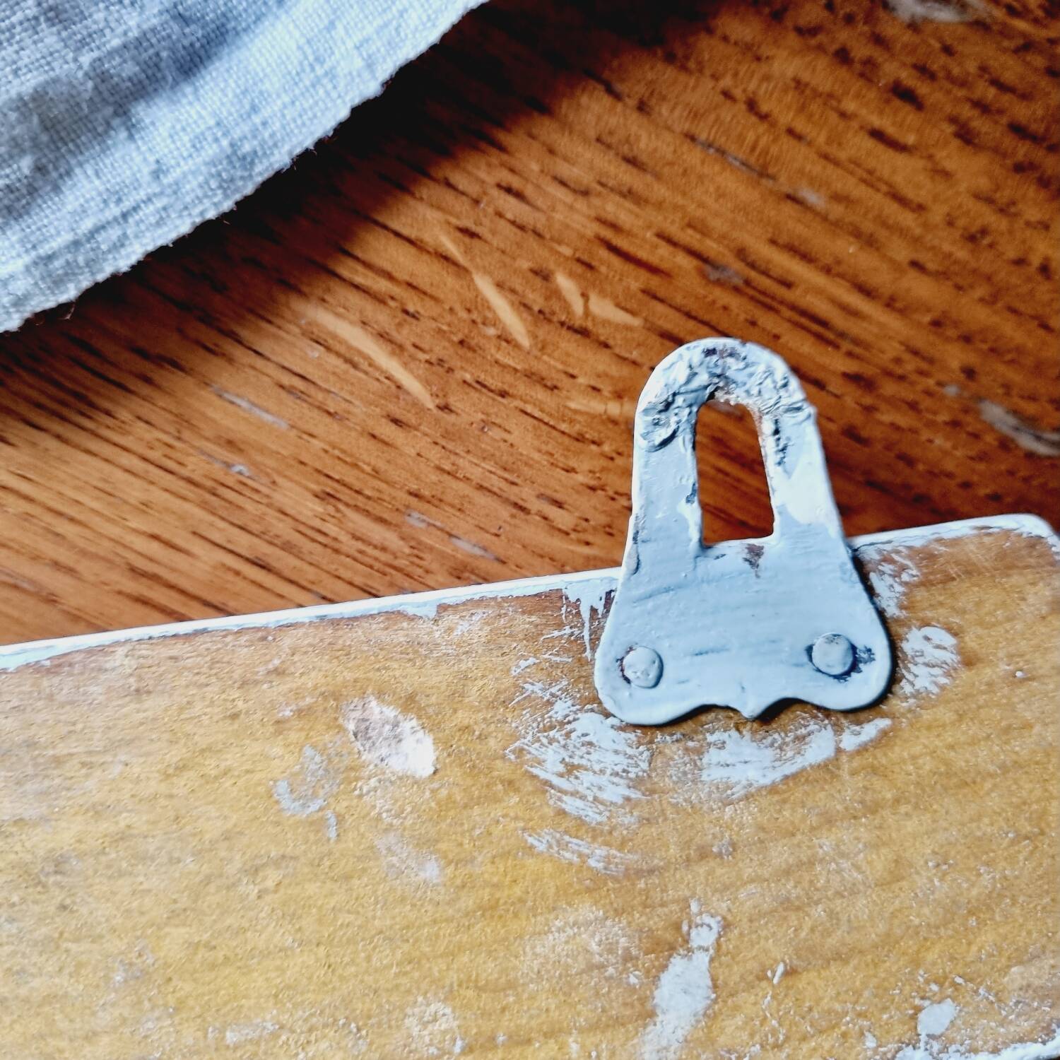 Old coat hook tea towel holder