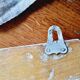 Old coat hook tea towel holder