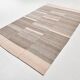 Tapis kilim vintage tons bruns et beige rosé, style minimal artisanal