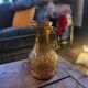 Amber relief glass pitcher. 1970s