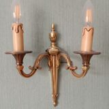 The pair of bronze wall lamps empire style 2 fires