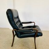Vintage mid-century Scandinavian black leather lounge chair 1970s