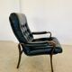 Vintage mid-century Scandinavian black leather lounge chair 1970s