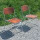 Pair of 1970s designer chairs in chrome metal and wood.