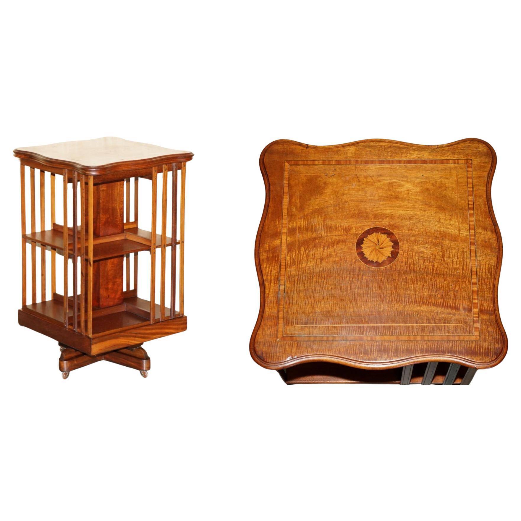 Sheraton-style rotating library table in walnut and satinwood.