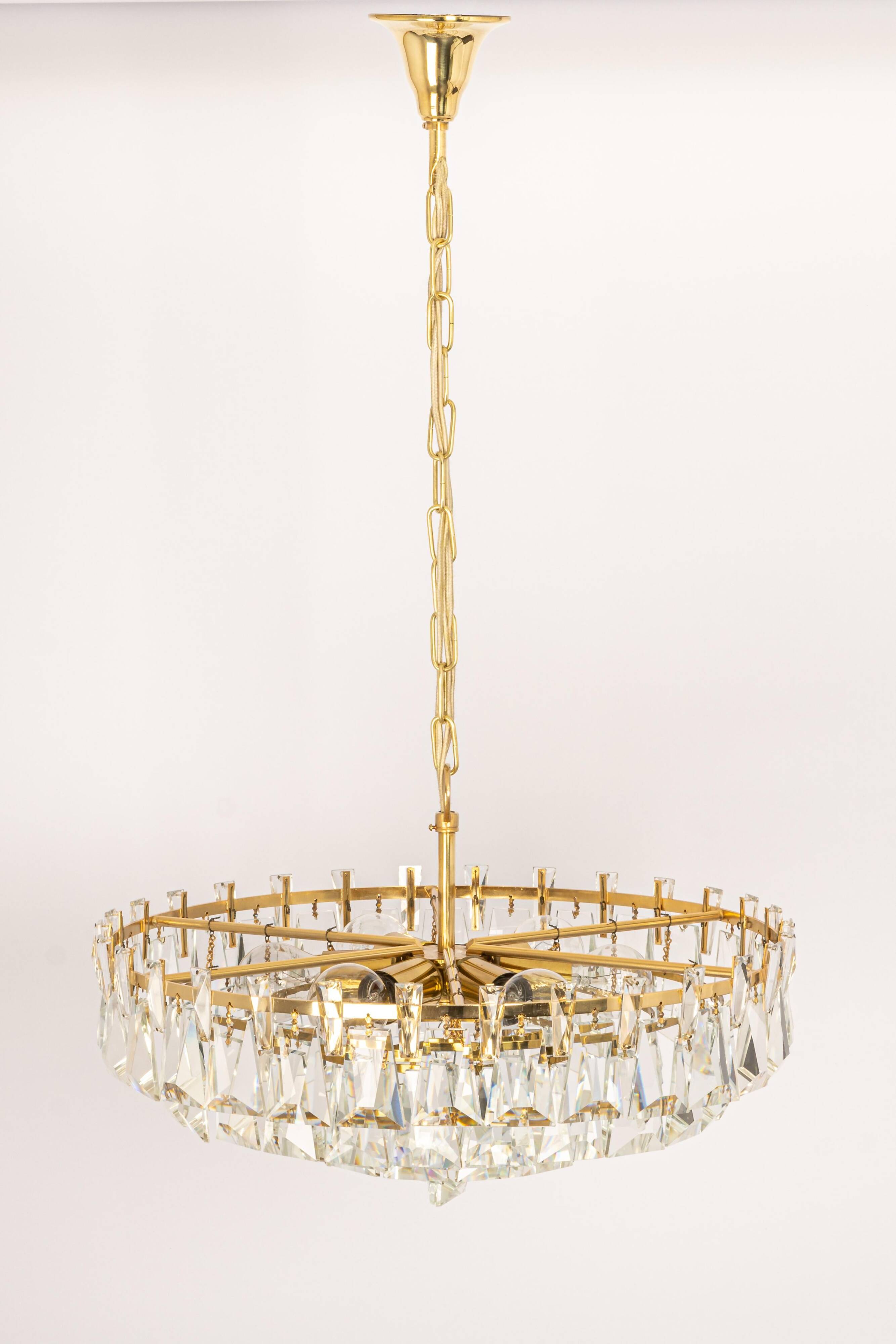 Large chandelier in gilded brass and crystal, by Palwa, Germany, 1970s.