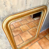 Louis-Philippe antique gilded mirror from the 19th century.