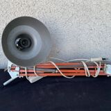 Orange articulated architect's lamp