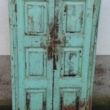 Old wooden cabinet with beautiful green patina
