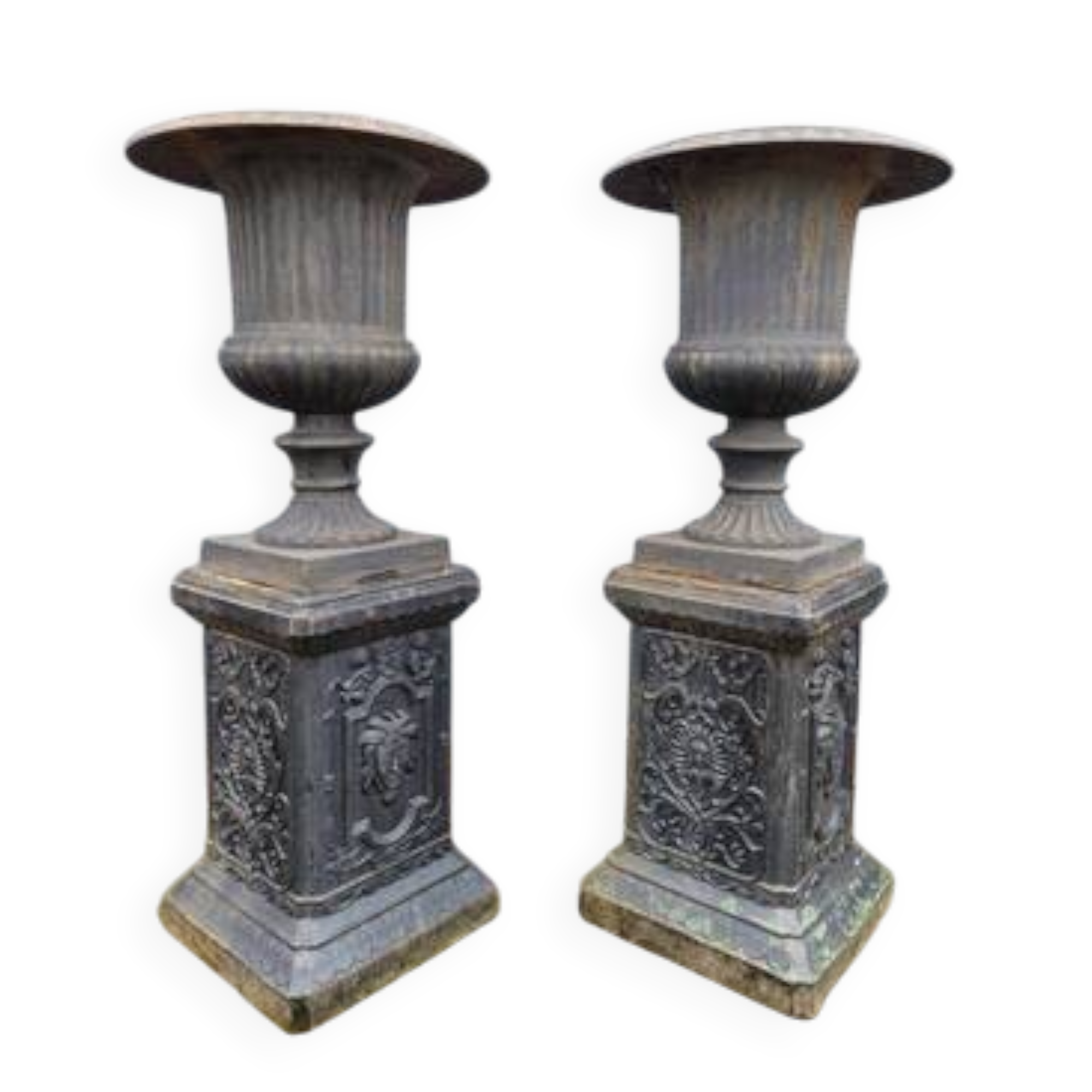 Large antique cast iron vases on pedestal
