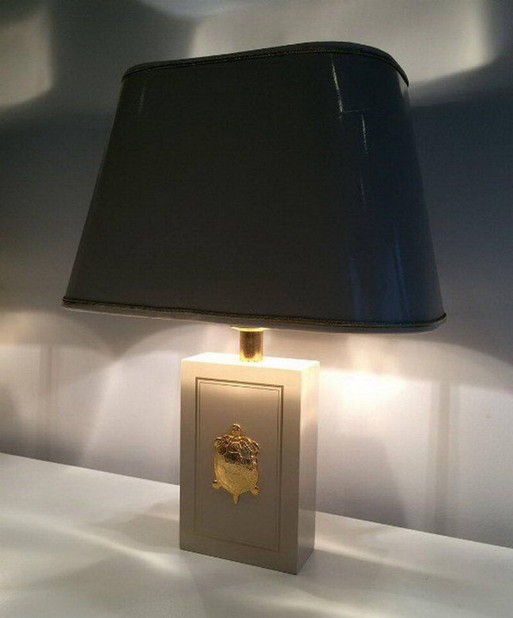 Pair of lamps decorated with golden turtles