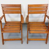 Vintage garden furniture set consisting of a table with extensions and 4 armchairs