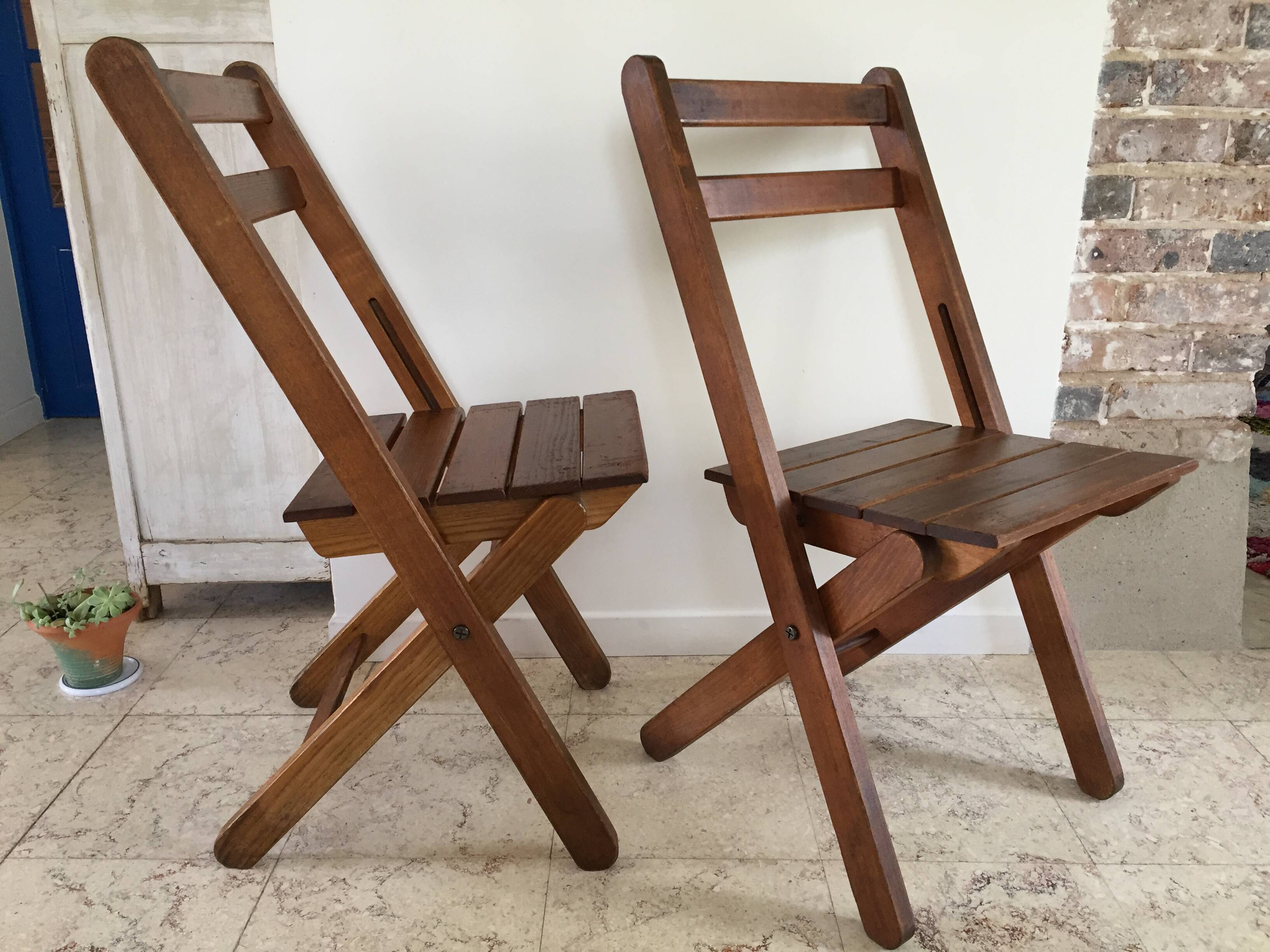 Folding chairs "by the wood fire"