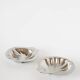 Pair of shell-shaped stainless steel catchalls, design, 1970