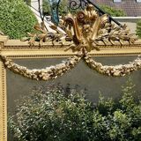 Gilded plaster mirror Louis XVl style