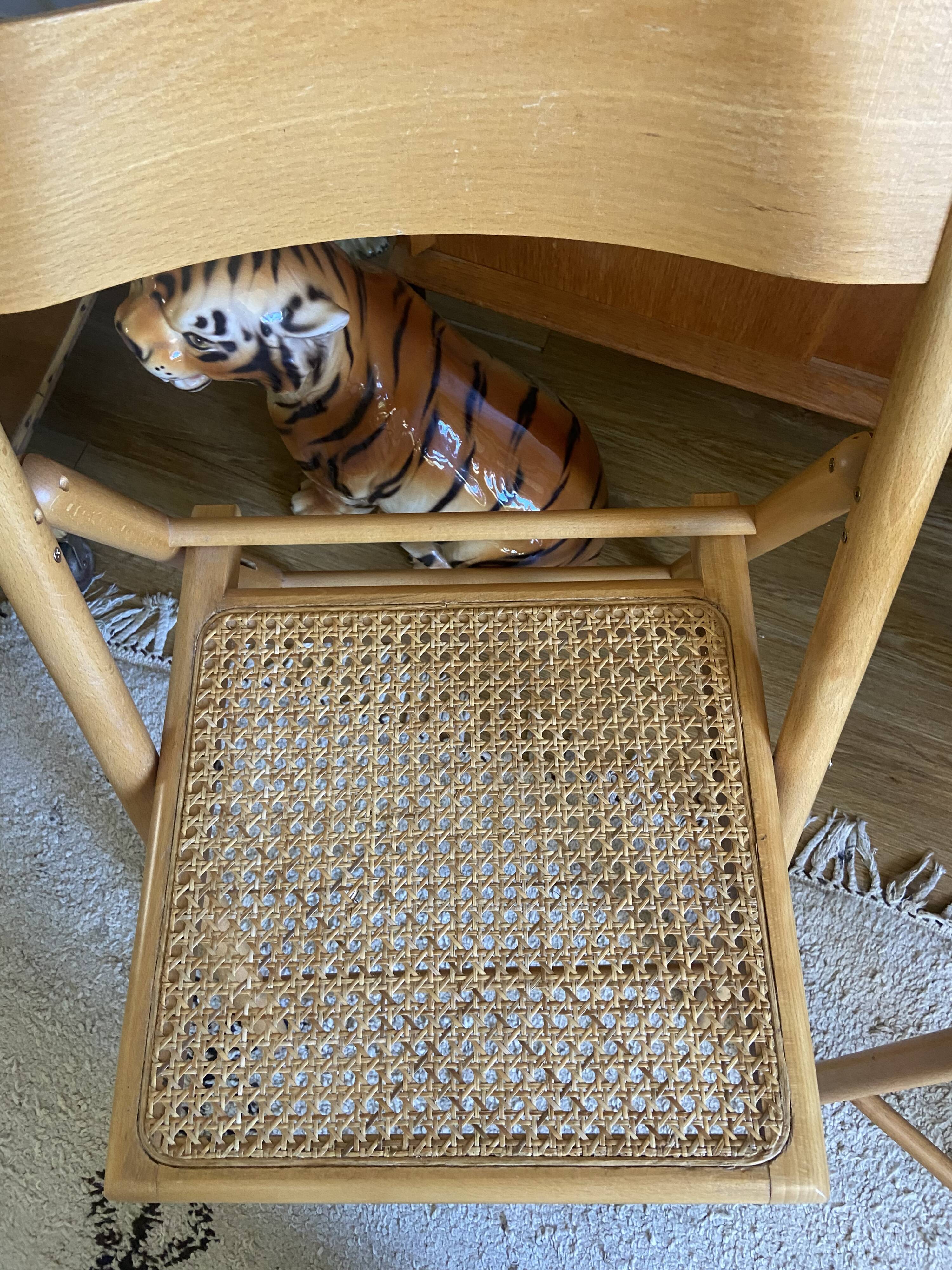 Pair of folding wooden chairs and vintage cannage
