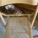 Pair of folding wooden chairs and vintage cannage