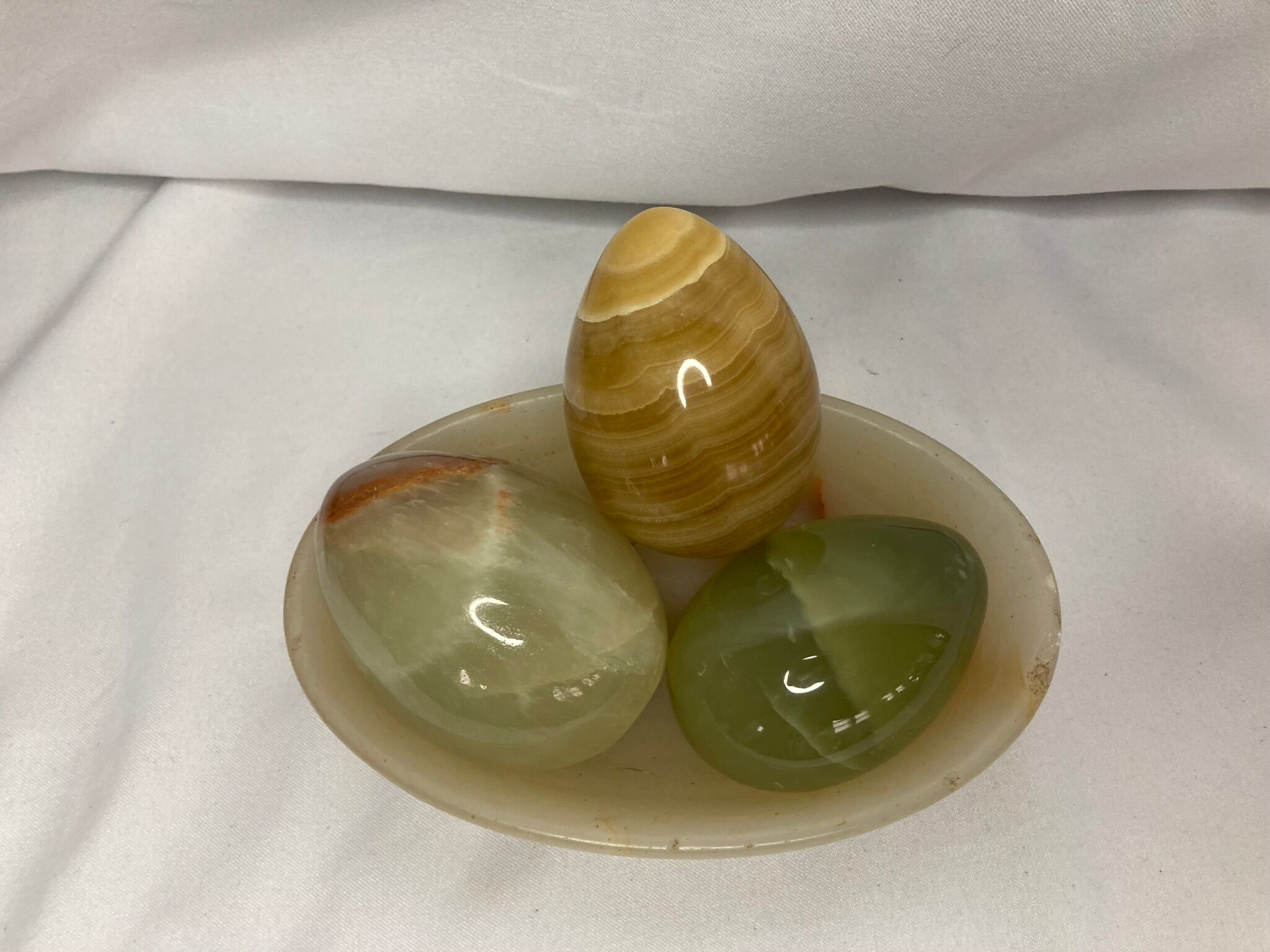Series of three onyx eggs and XXth cup