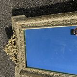 Antique mirror in Napoleon III style, richly carved gilded frame, 19th century