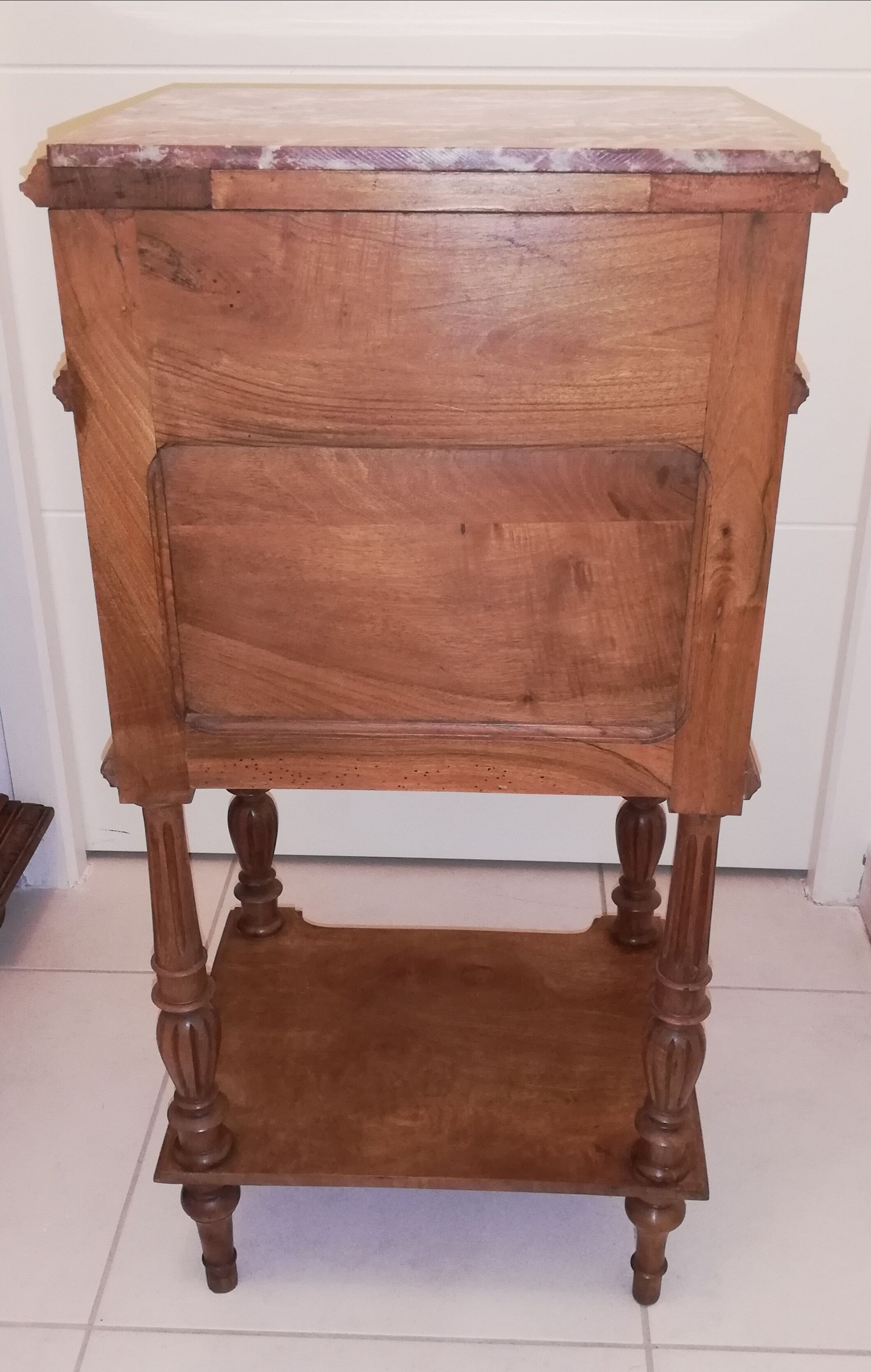 Louis XVI style bedside with marble top and carved door