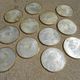 Series of 12 vintage mother-of-pearl coasters