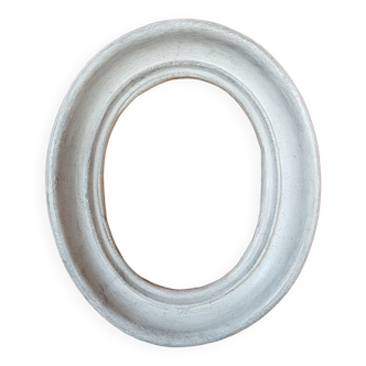 Cadre ovale plâtre patiné